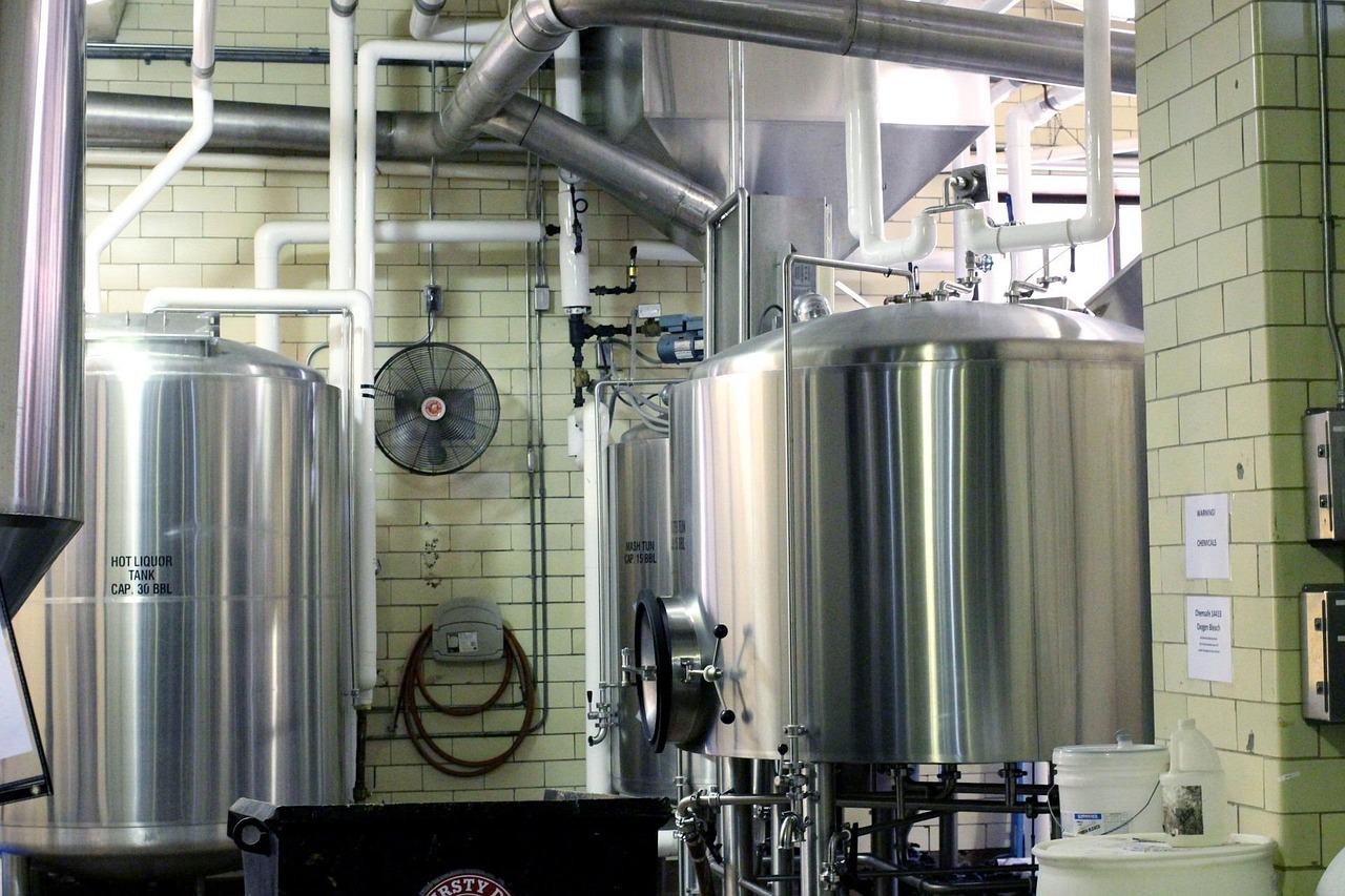 Commercial brewing equipment being cleaned with pure water